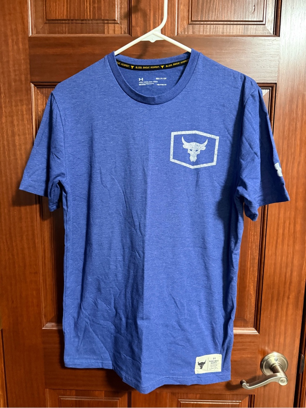 Under Armour Men’s Blue Short-Sleeve Athletic Tee with Shield Logo